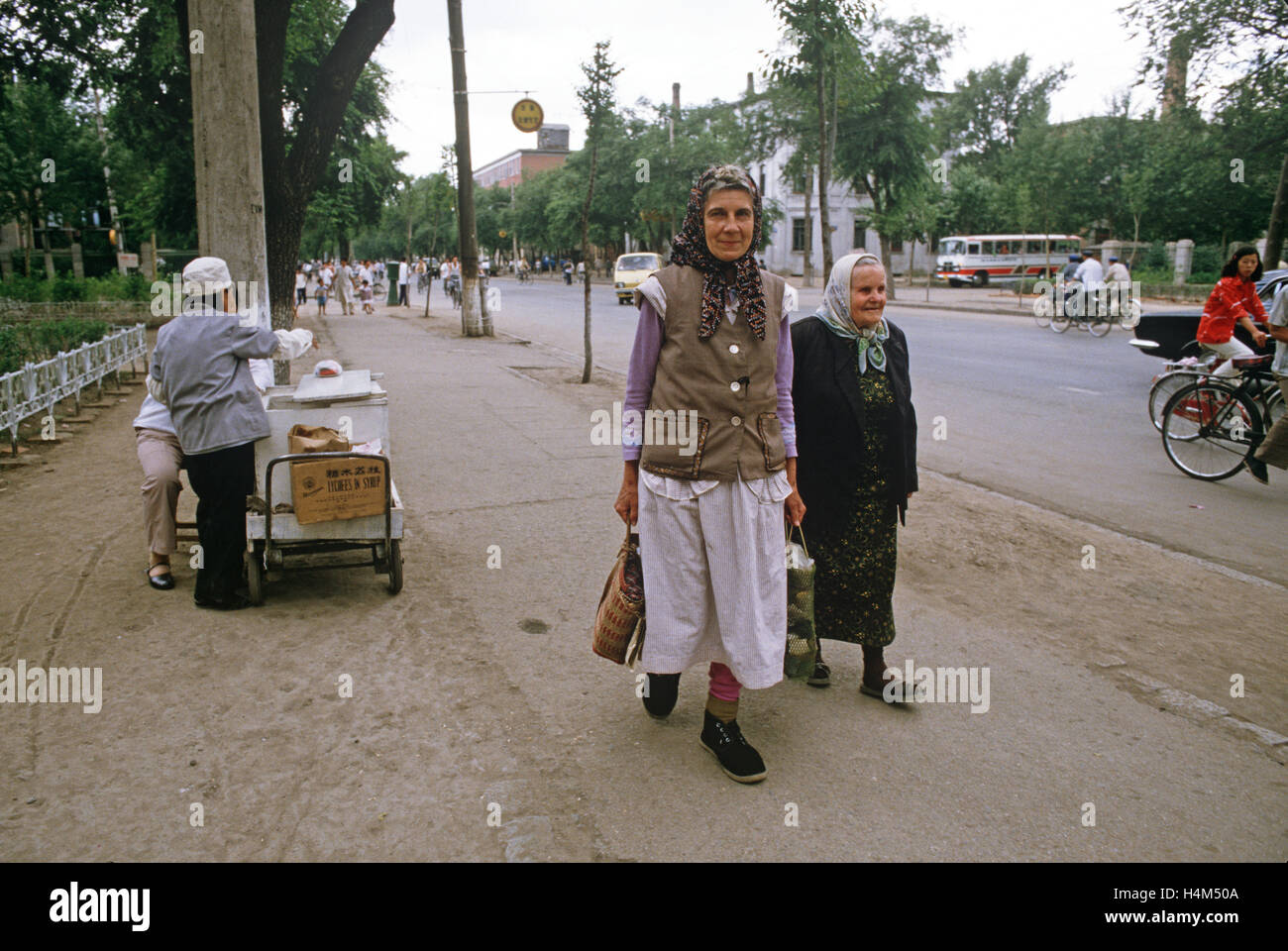 Harbin Russians on way to Russian Orthodox church, Harbin,  Heilongjiang Province, China Stock Photo