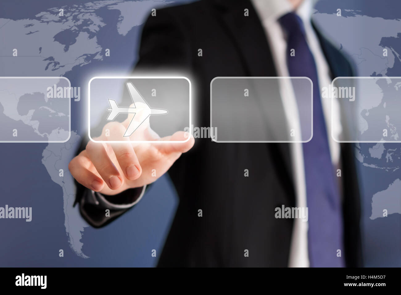 Businessman with world map touch screen Stock Photo