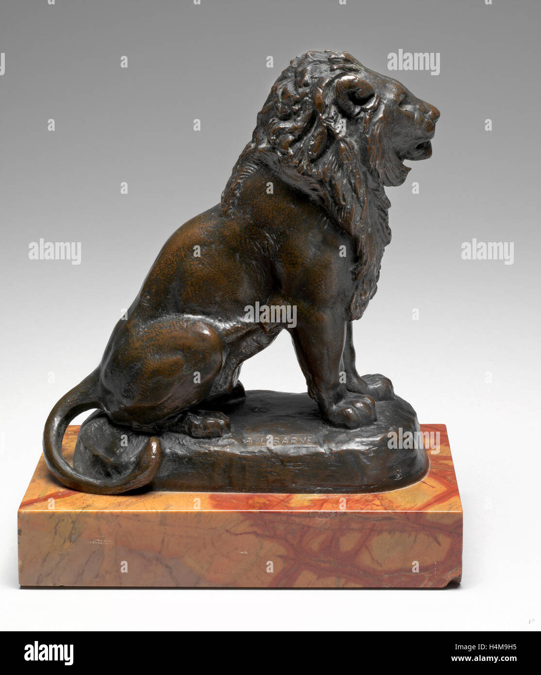 Antoine-Louis Barye, Seated Lion, French, 1795-1875, model c. 1846, cast after 1870, bronze Stock Photo