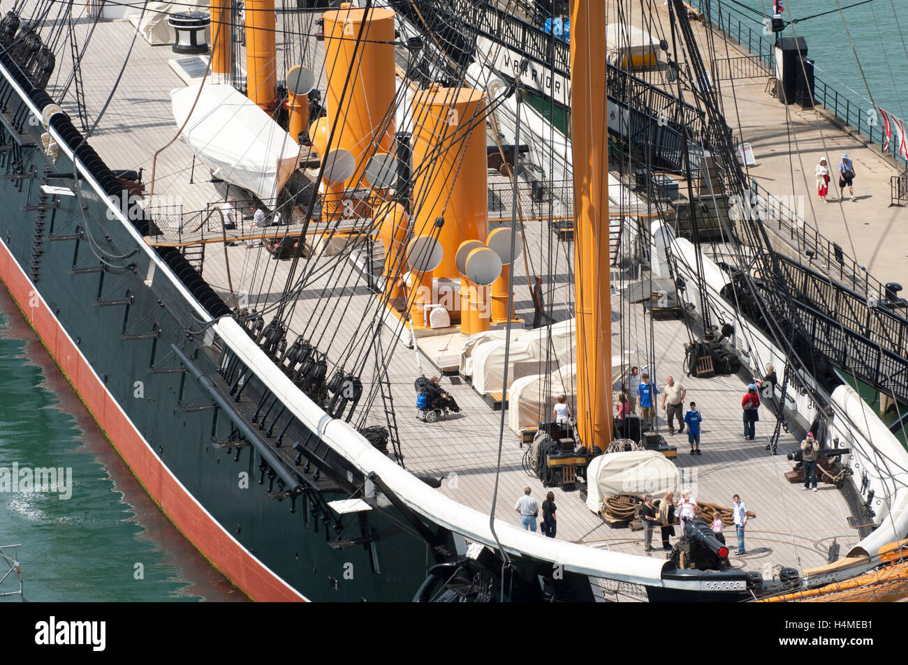 Aerial view of the main deck of HMS Warrior with tourists, The Hard, Portsmouth Harbour, Portsmouth, Hampshire, UK. Stock Photo