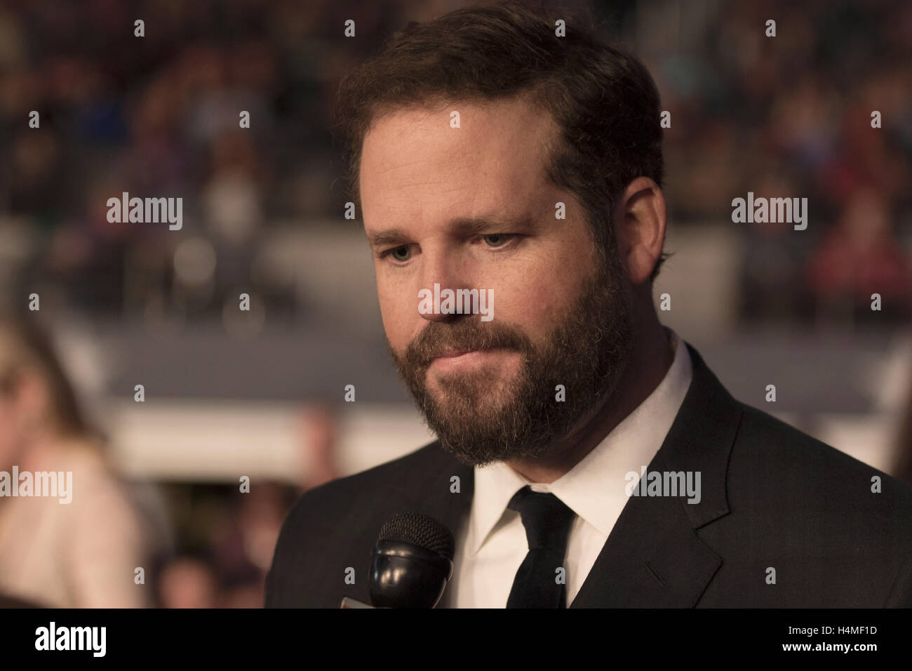 Actor David Denman attends the 13 Hour red carpet premiere at AT&T Stadium on January 12th, 2016 in Dallas, Texas. Stock Photo