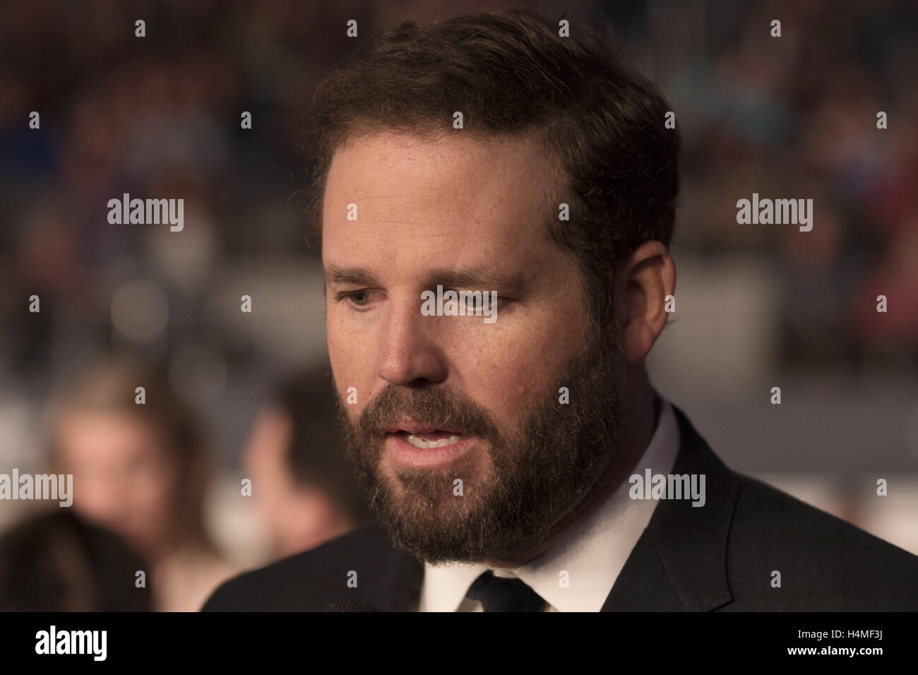 Actor David Denman attends the 13 Hour red carpet premiere at AT&T Stadium on January 12th, 2016 in Dallas, Texas. Stock Photo