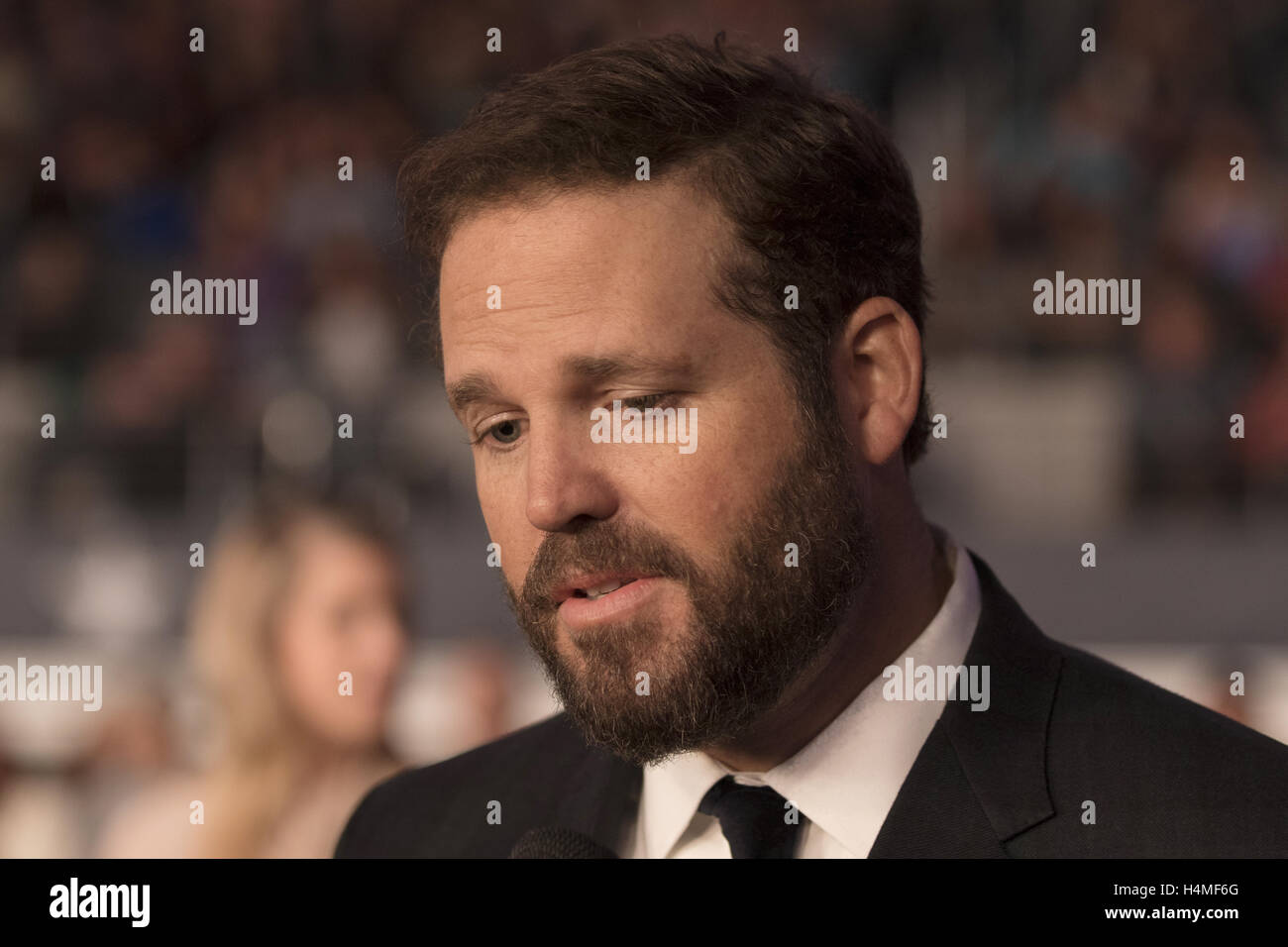 Actor David Denman attends the 13 Hour red carpet premiere at AT&T Stadium on January 12th, 2016 in Dallas, Texas. Stock Photo