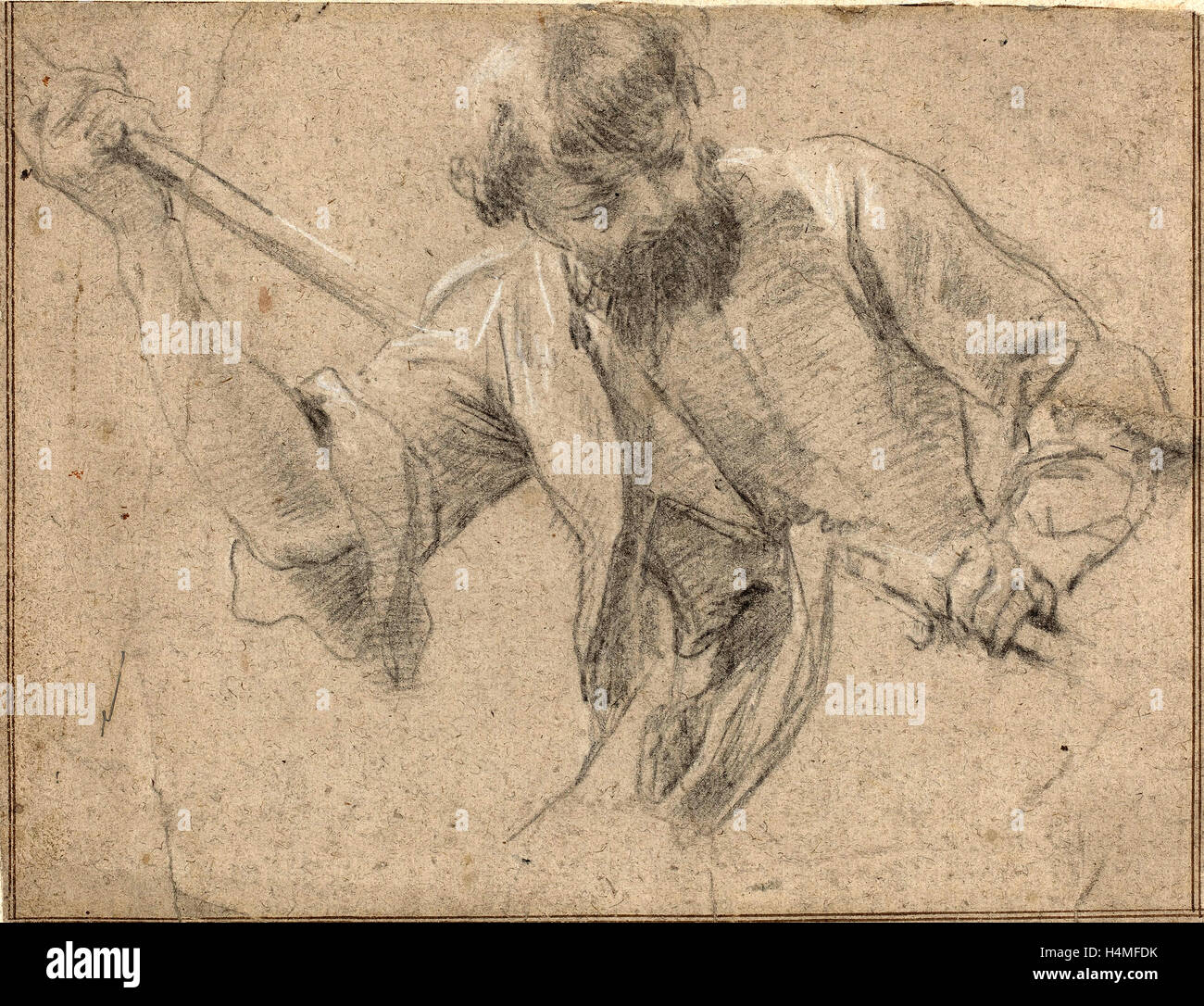Attributed to Simon Vouet (French, 1590 - 1649), A Bearded Man with a Staff, black chalk and graphite, heightened with white Stock Photo