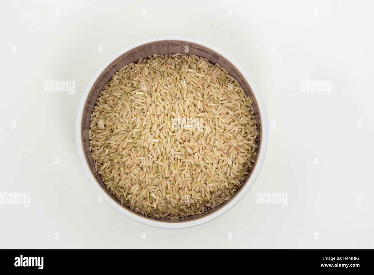 Thai Fragrant Rice in the bowl on white background Stock Photo - Alamy