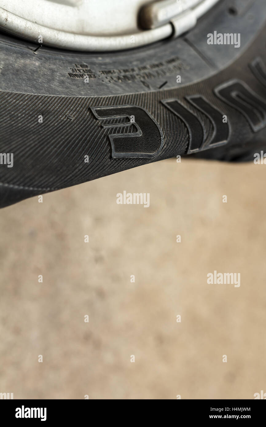 car wheel flat tire on the road Stock Photo Alamy