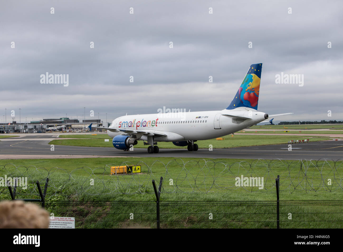 Small Planet Airbus A320-214 Aeroplane at Manchester Ringways Airport Stock Photo