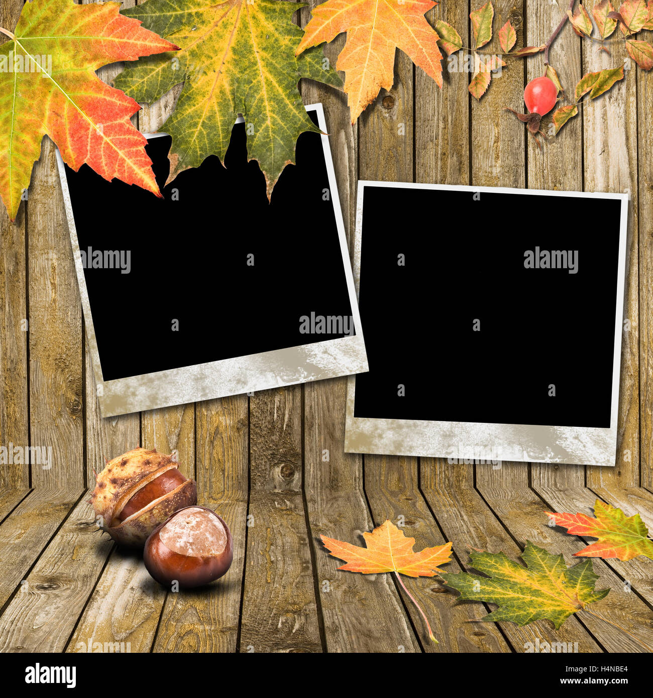 Autumn Leaves and photo frame over wooden background Stock Photo - Alamy
