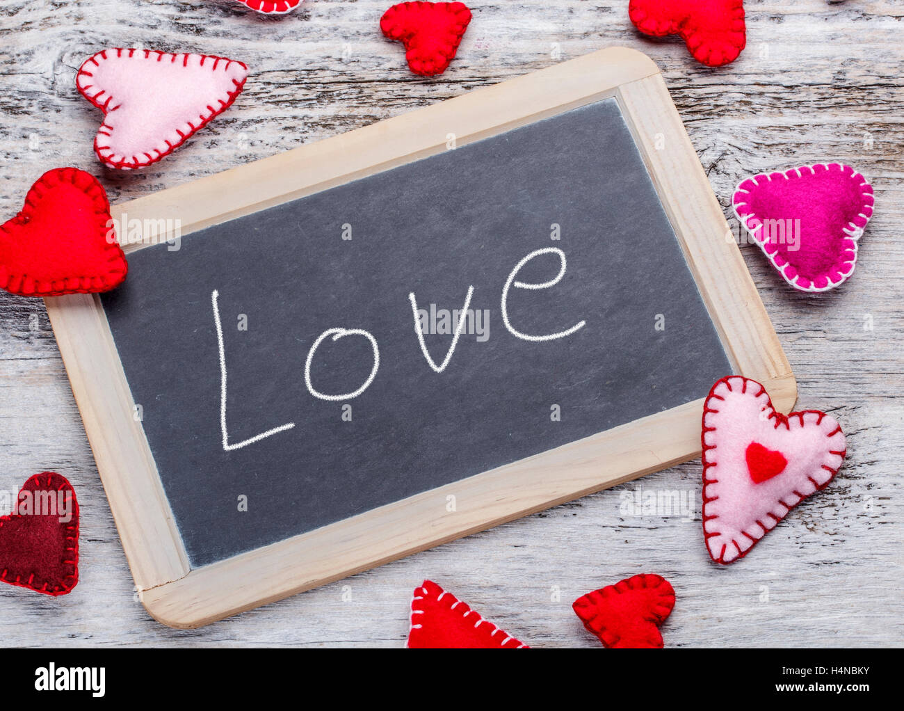 Love. Handwritten message on a chalkboard Stock Photo