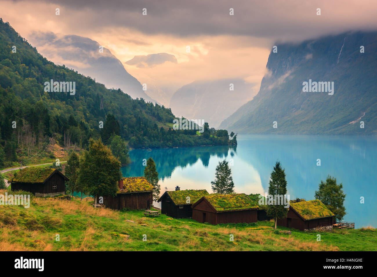 Old farmhouses at Lovatnet. A lake close to the village of Loen in Sogn og Fjordane county, Norway. Stock Photo
