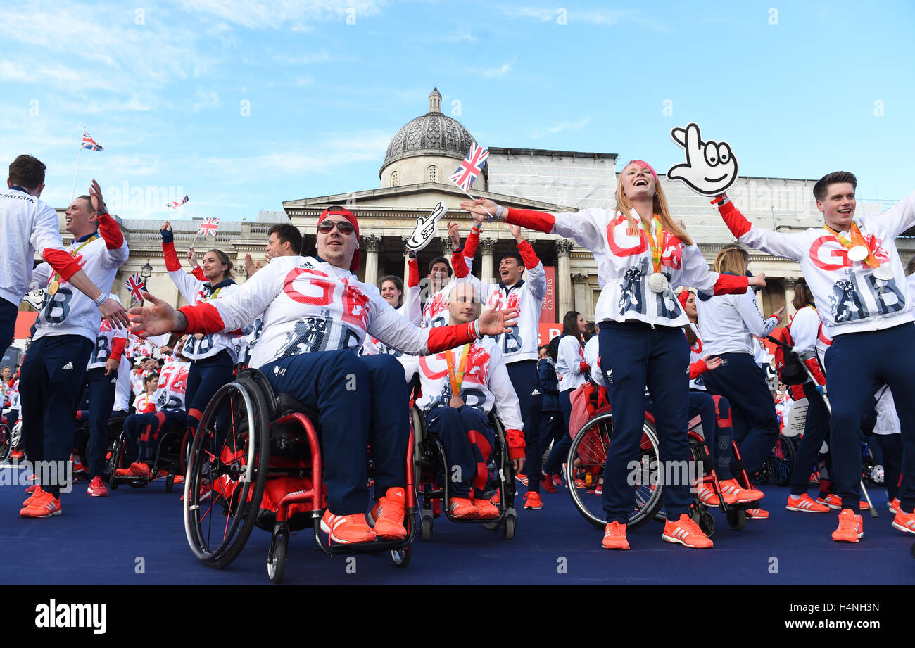 Team GB Olympic and Paralympic athletes celebrate on stage during the