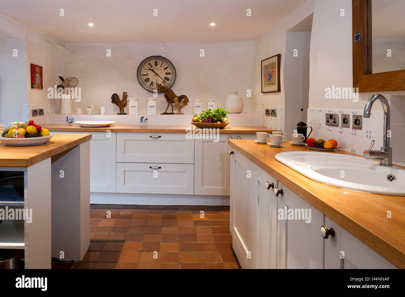 A new fitted kitchen with original period cottage features Stock Photo