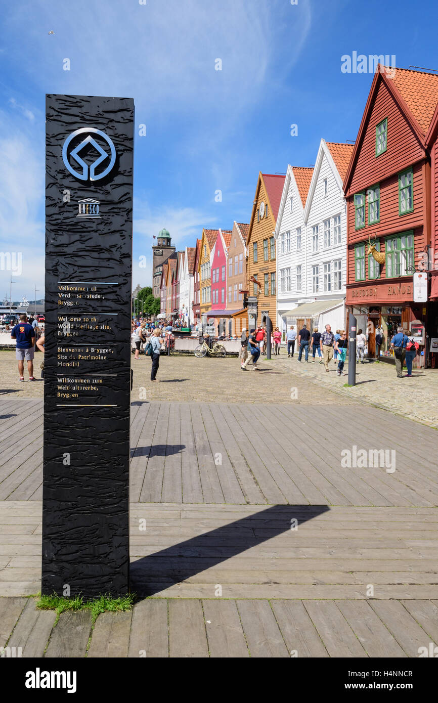 UNESCO World Heritage site sign at the wooden warehouses and shops, Bryggen, Bergen, Norway Stock Photo
