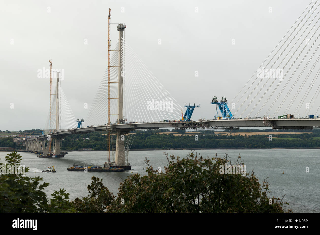 The Forth Road Bridge and Queensferry Crossing during construction, North Queensferry, Fife, Scotland. Stock Photo