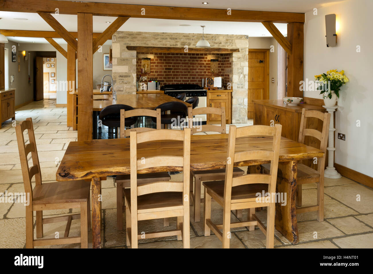 A luxury upmarket open plan barn conversion kitchen and dining area Stock Photo