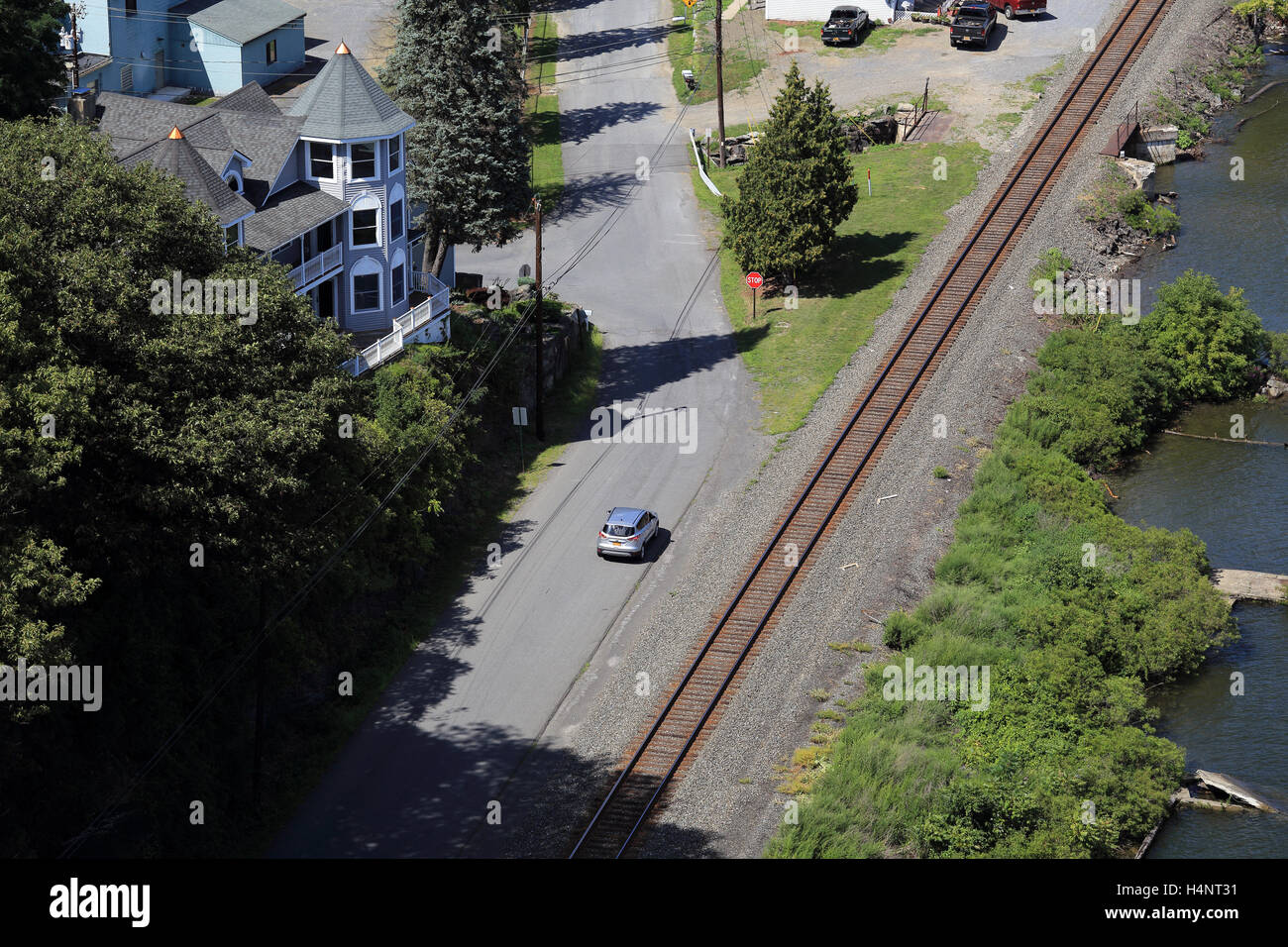 car and railroad tracks Stock Photo Alamy