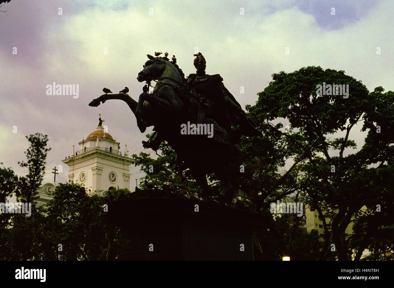 A statue of Simon Bolivar mounted on horseback in Bolivar Plaza, Caracas, Venezuela, 1975 Stock Photo