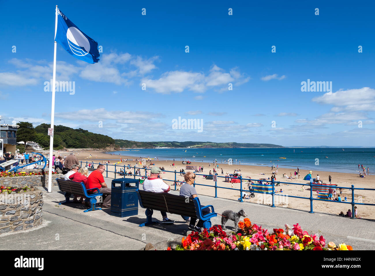 People looking out to sea at Saundersfoot, Pembrokeshire, Wales, UK