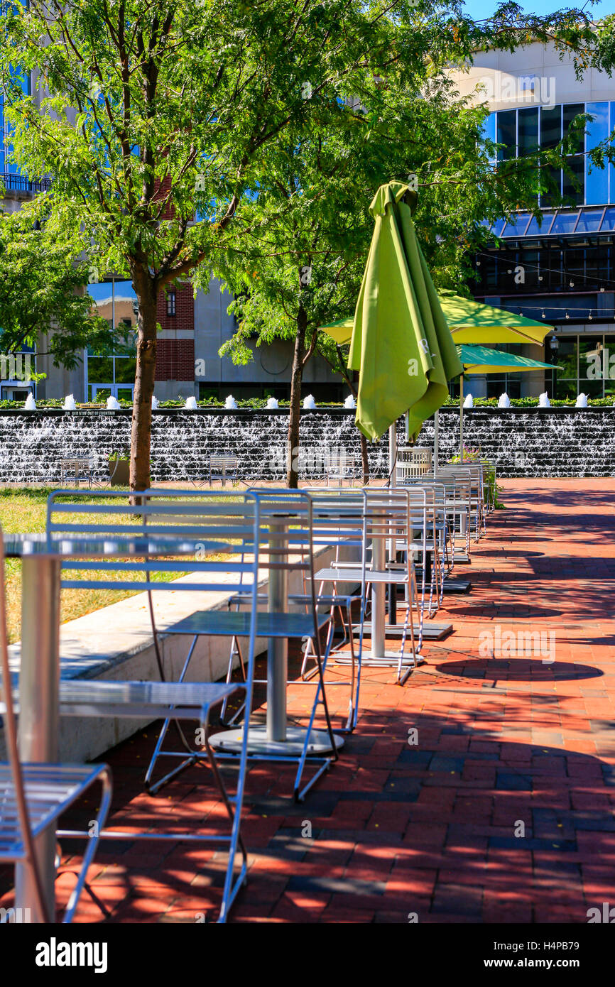 Tables and chairs in Triangle Park in downtown Lexington KY Stock Photo