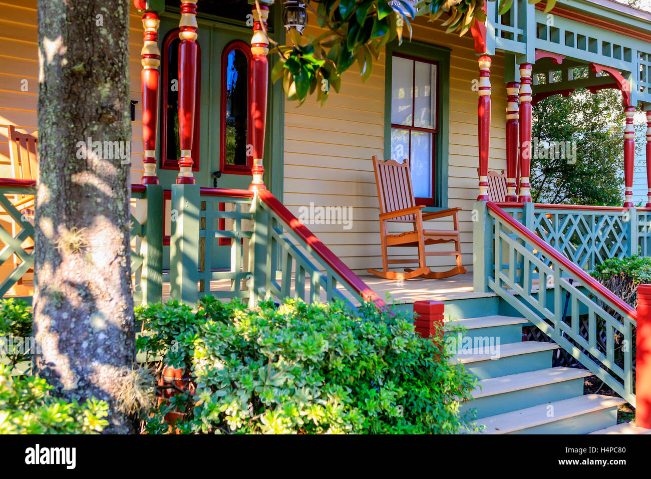 Rocking chair on the porch of this homes around Ash Streets in the historic district of Fernandina Beach City in Florida Stock Photo