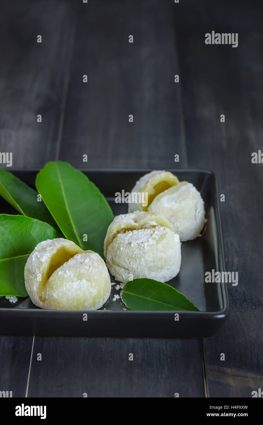 Daifuku Mochi Japanese dessert on dish over wooden background Stock Photo