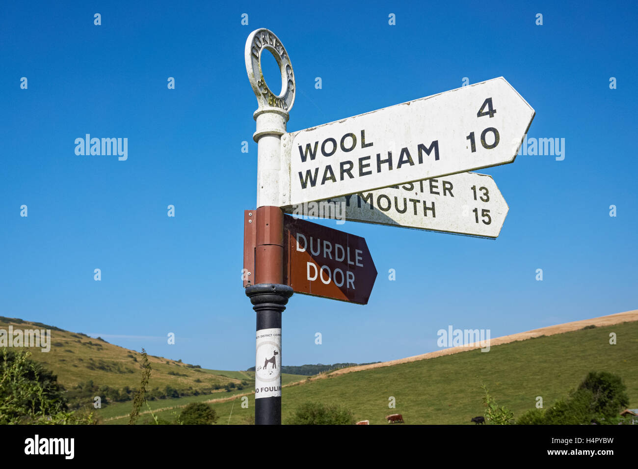 Direction signpost in West Lulworth, Dorset England United Kingdom UK Stock Photo