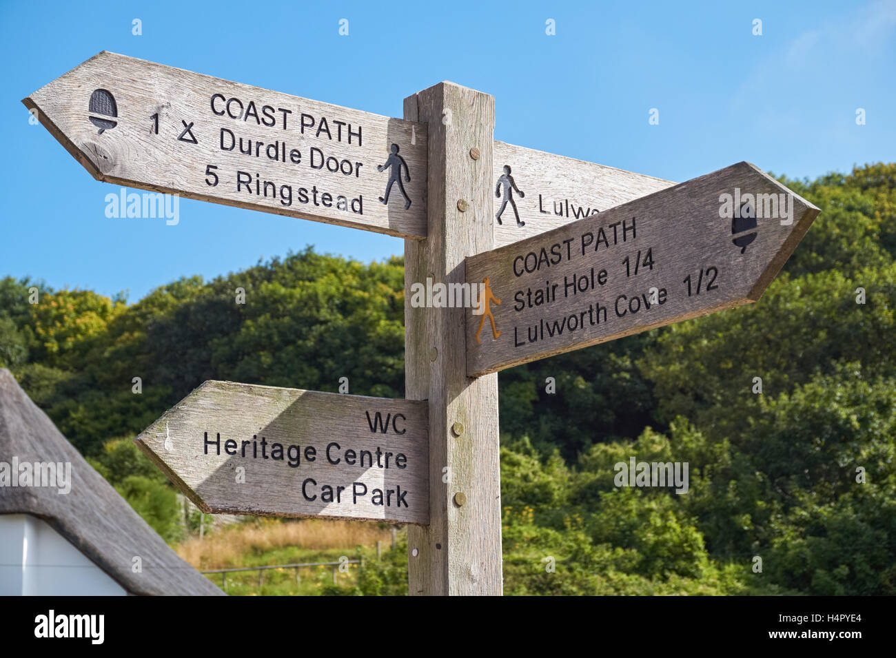 Direction signpost in West Lulworth Dorset England United Kingdom UK Stock Photo