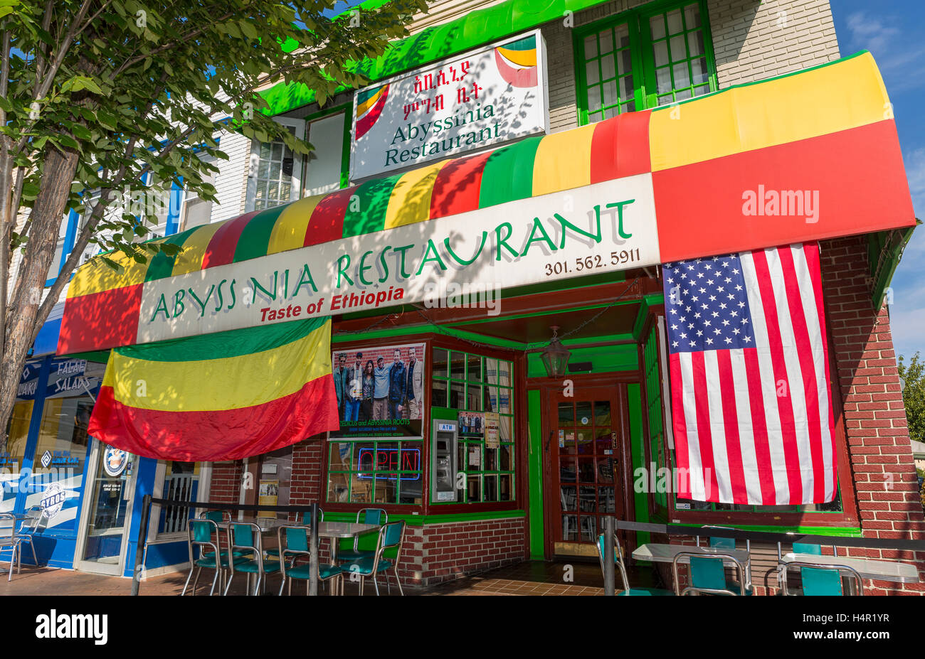SILVER SPRING, MARYLAND, USA - Abyssinia Ethiopian Restaurant on Georgia Avenue. Flags of Ethiopia and USA. Stock Photo