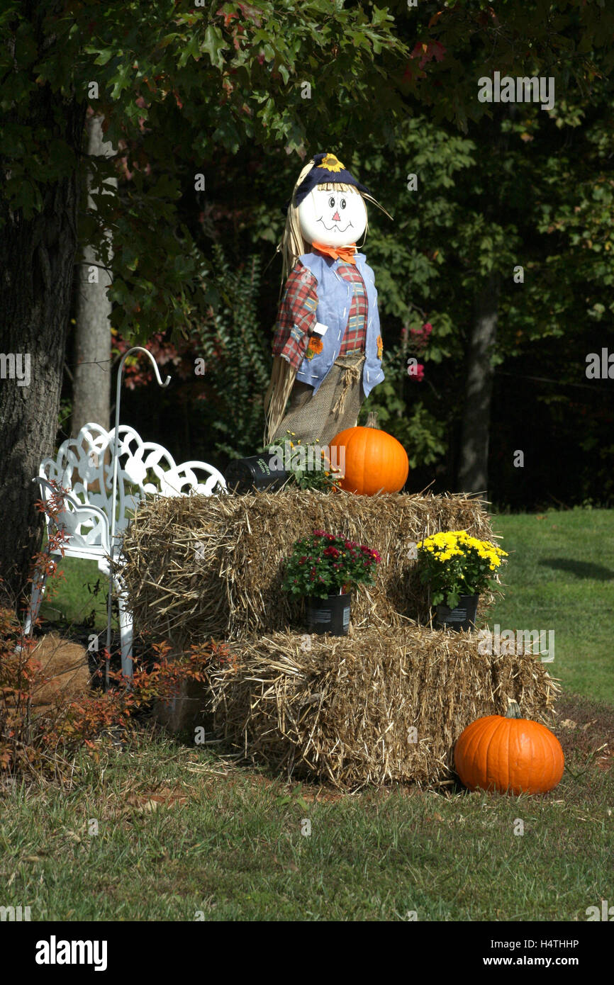 Outdoor Fall Decoration With Scarecrow Hay Mums And Pumpkins