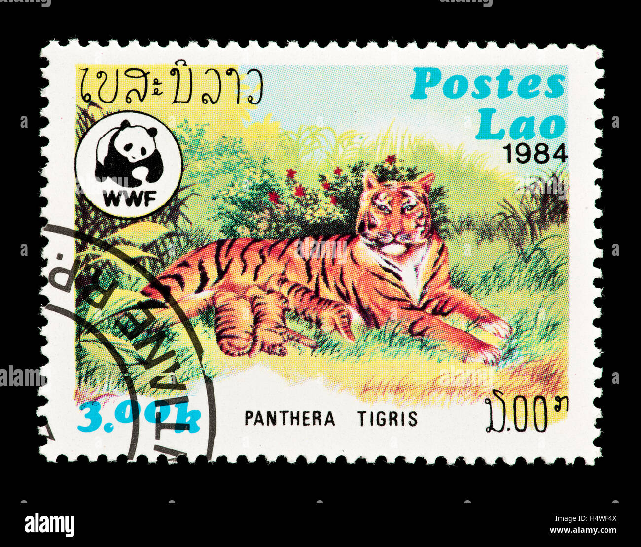 Postage stamp from Laos depicting a female tiger and cubs (Panthera ...