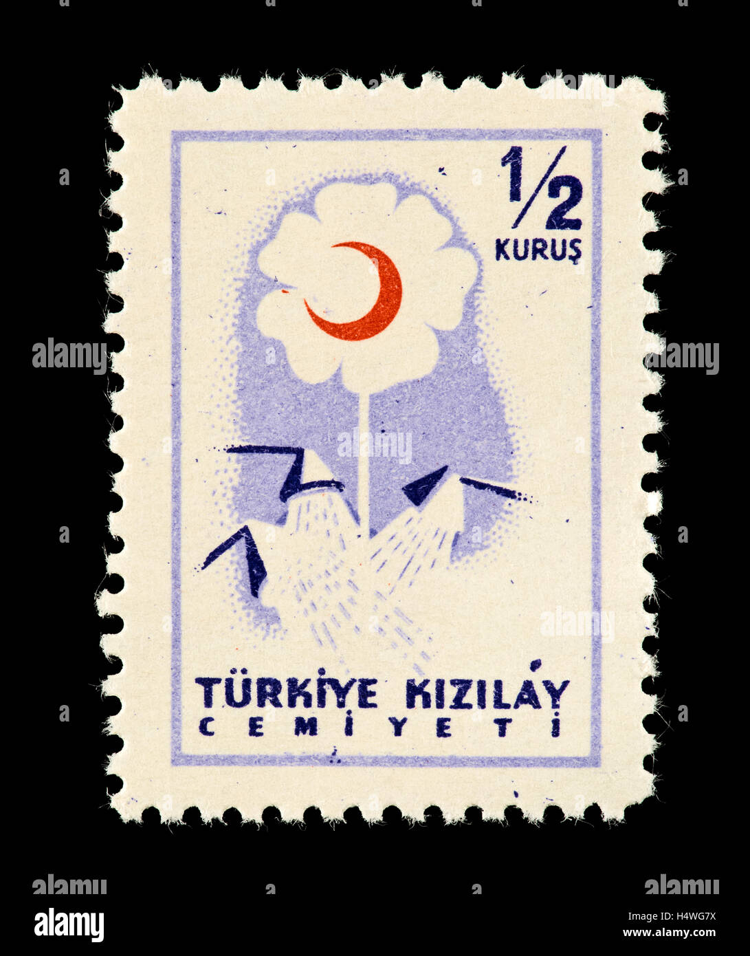 Postal tax stamp from Turkey depicting a flower and Red Crescent Stock Photo