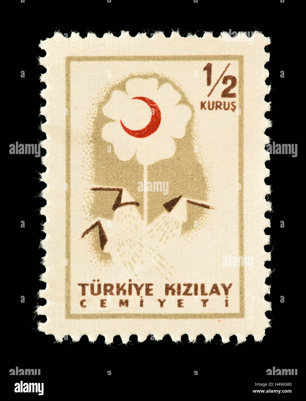 Postal tax stamp from Turkey depicting a flower and Red Crescent Stock Photo
