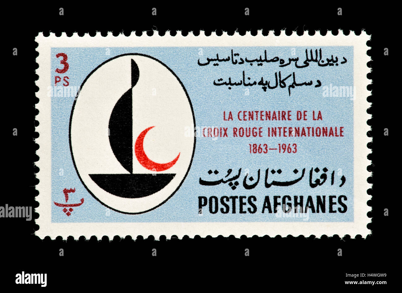 Postage stamp from Afghanistan depicting a lamp, centennial of the International Red Cross. Stock Photo
