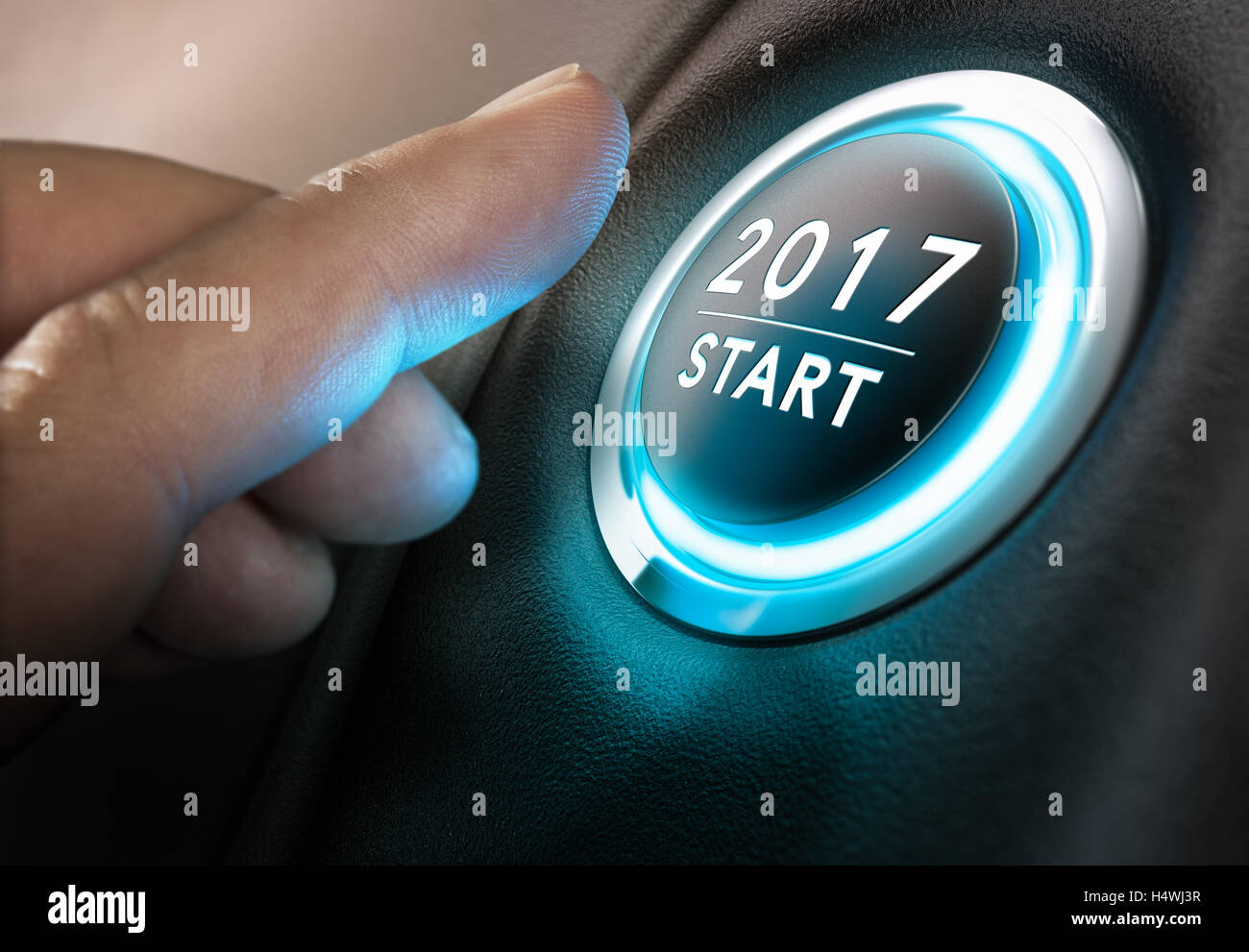 Hand about to press a 2017 button. Concept of new year, two thousand seventeen Composite between photography and a 3D background Stock Photo