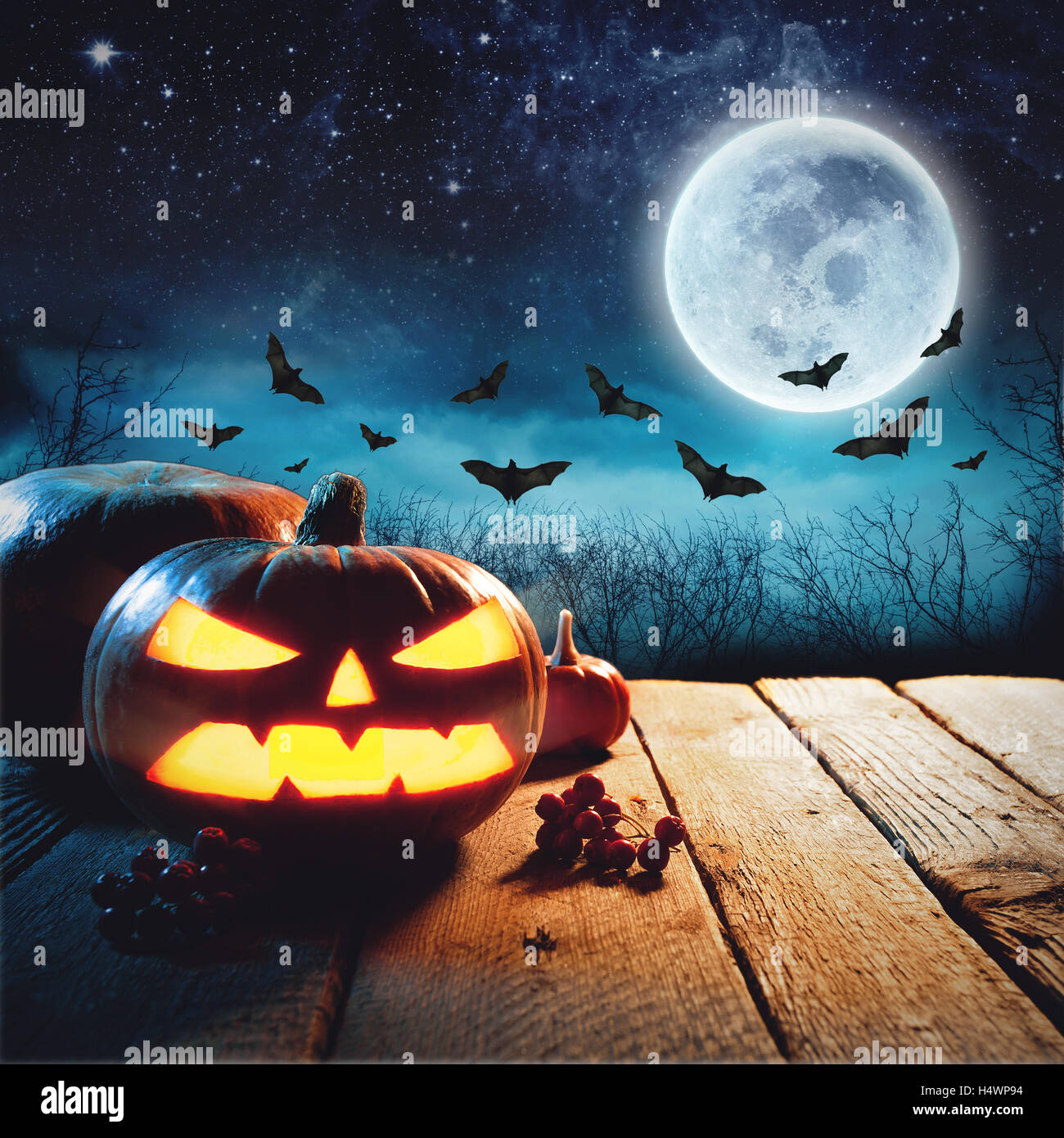 Halloween Pumpkin in a dark mist Forest. Elements of this image furnished by NASA Stock Photo