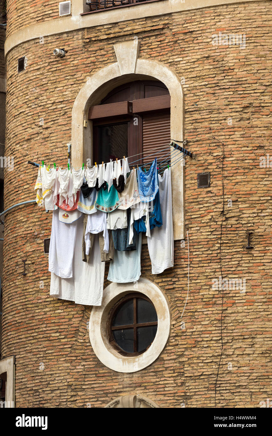 VITORIA-GASTEIZ, SPAIN - OCTOBER 16, 2016: drying clothes in front of a window Stock Photo
