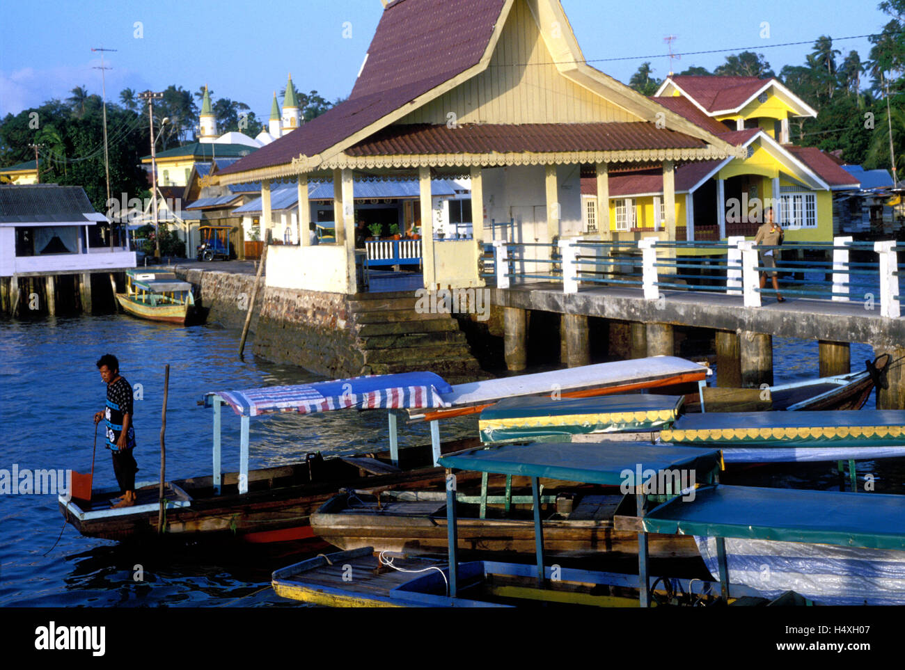 Indonesia Bintan ferry port harbour scene penyenget Stock Photo