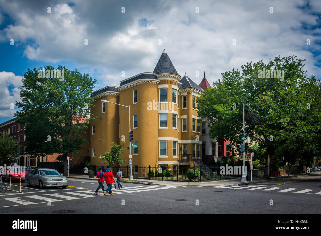 Rowhouses and an intersection in Columbia Heights, Washington, DC. Stock Photo