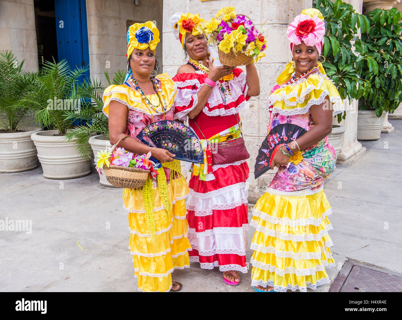 Cuban women with traditional clothing in old Havana street Stock Photo -  Alamy