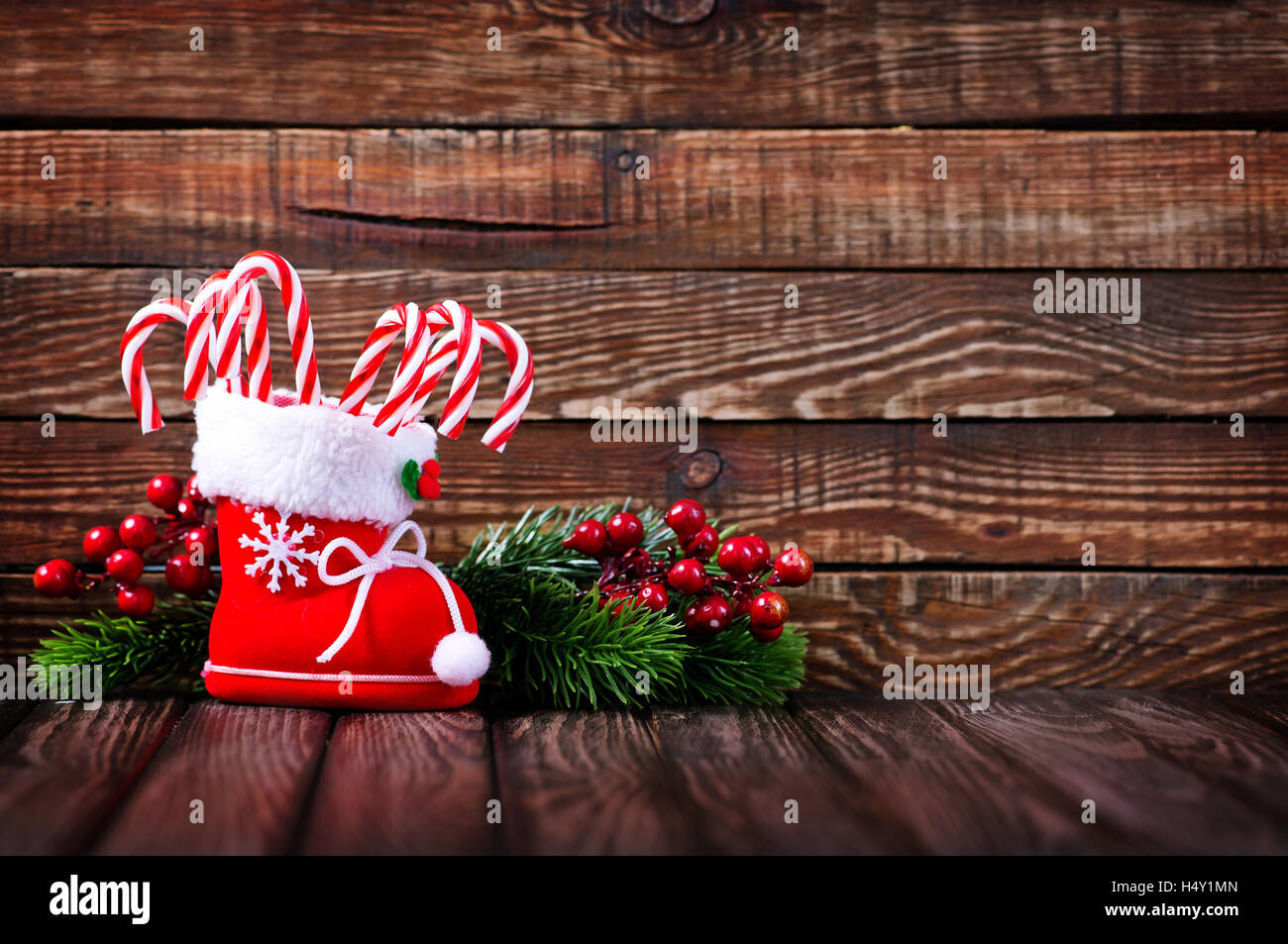Candy Canes And Christmas Decoration On A Table Stock Photo