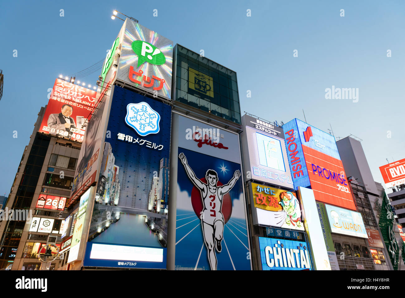 Osaka, Japan - November 29 2015: The Glico Man billboard is one of the Osaka’s landmark in Dotonbori of Osaka, Japan. Stock Photo