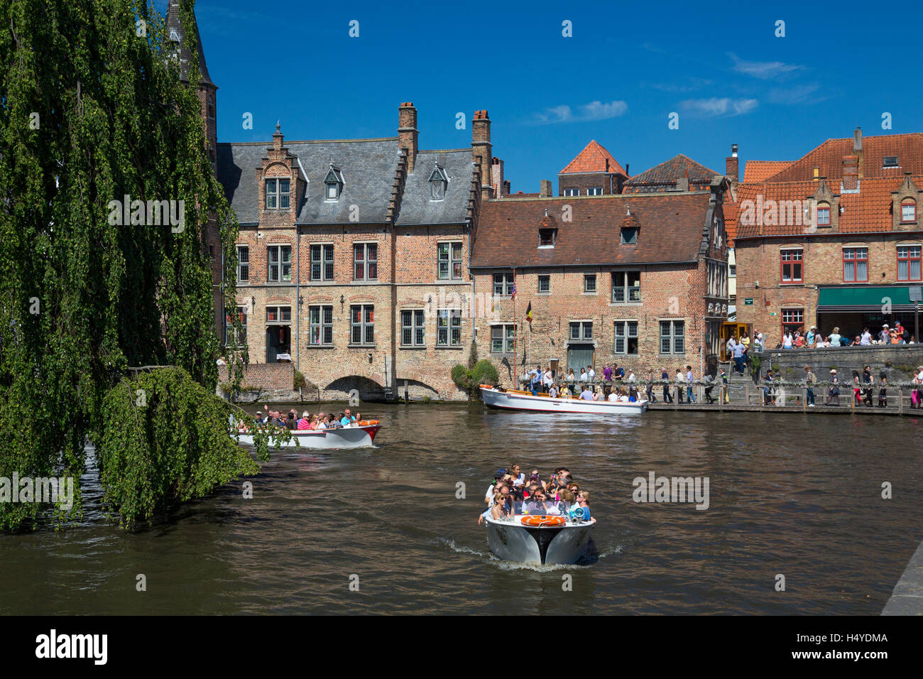 Canal tour boats , Dijver, Bruges, Belgium Stock Photo