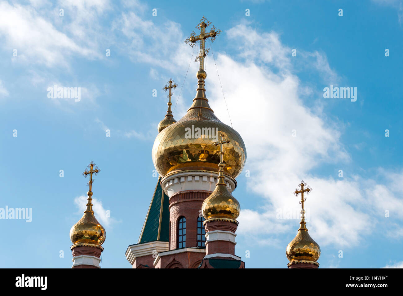 dome of the Orthodox church with crosses on a background of blue sky ...