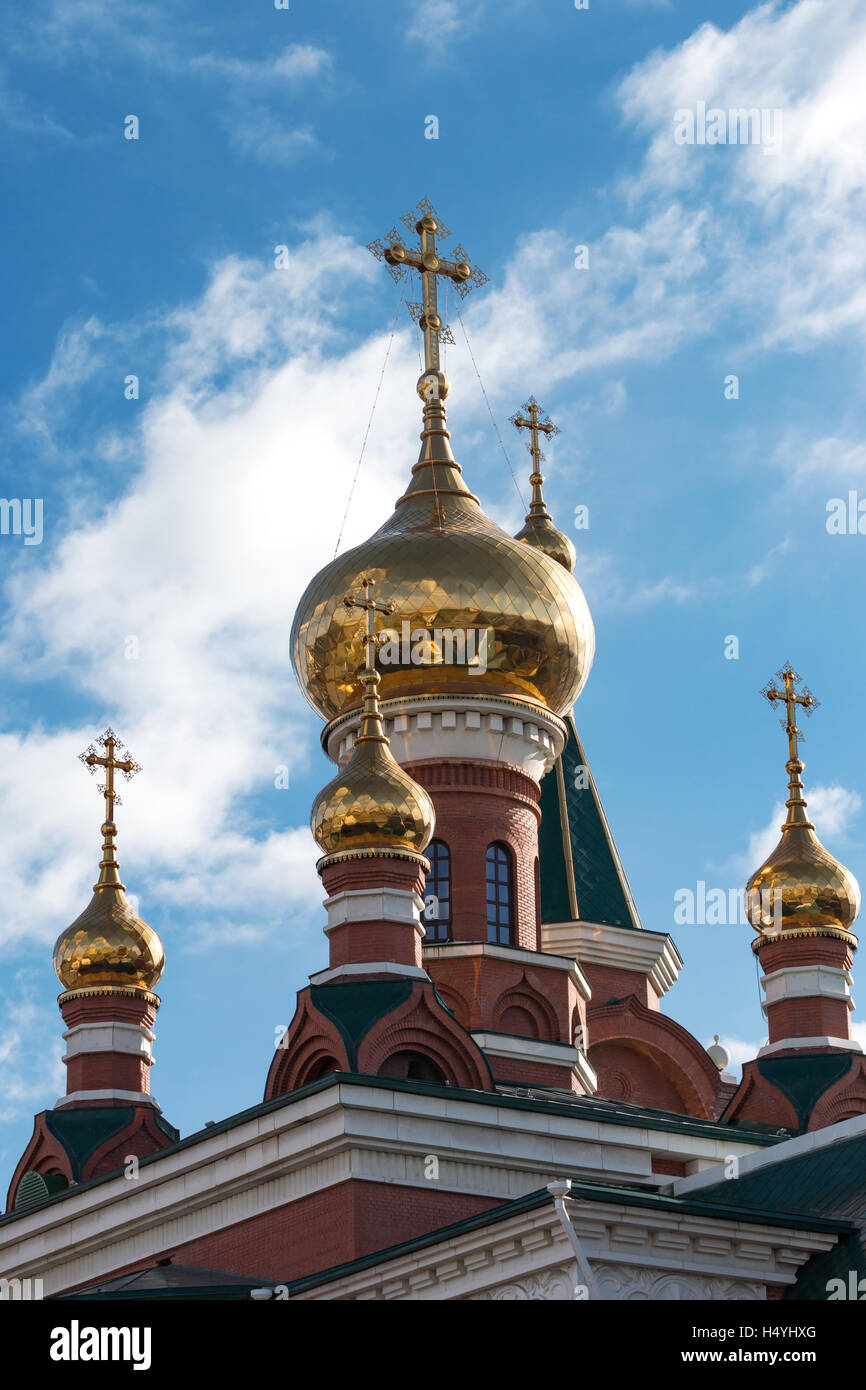 dome of the Orthodox church with crosses on a background of blue sky ...