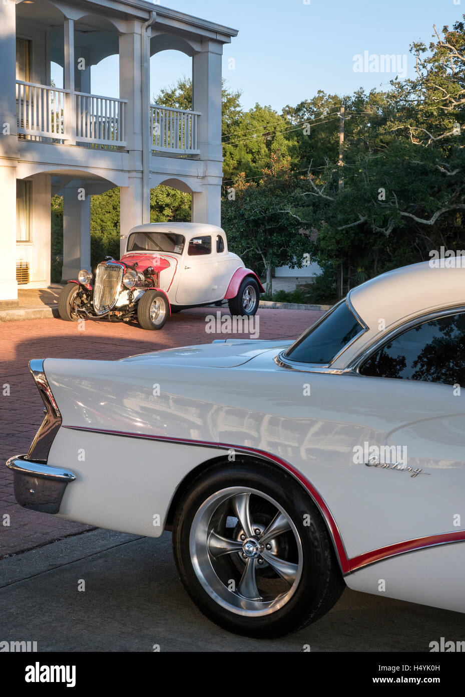 Custom cars parked outsde a motel in Gulf port Mississipii USa Stock Photo
