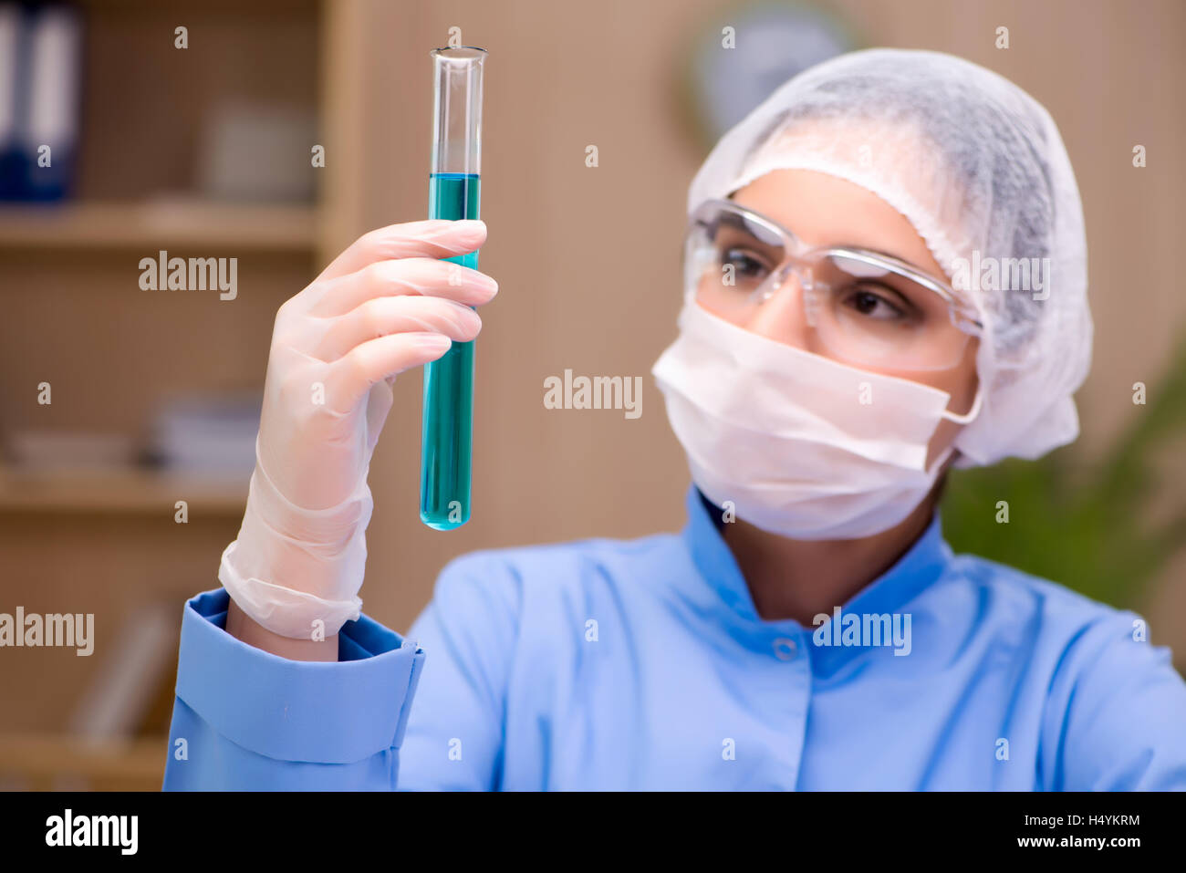 Lab chemist working with microscope and tubes Stock Photo Alamy
