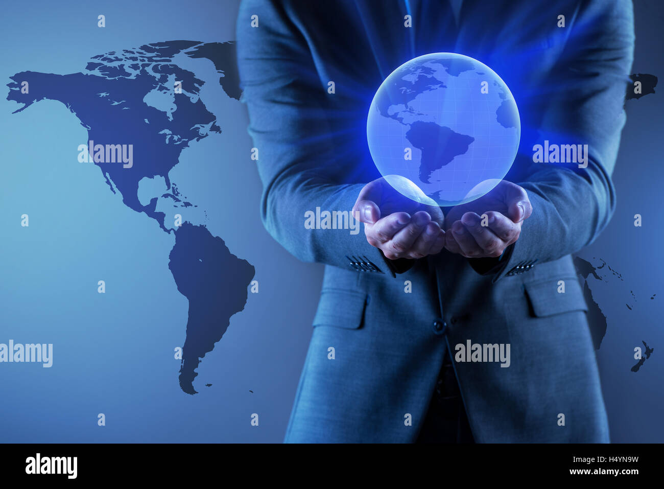 Businessman holding globe in global business concept Stock Photo - Alamy