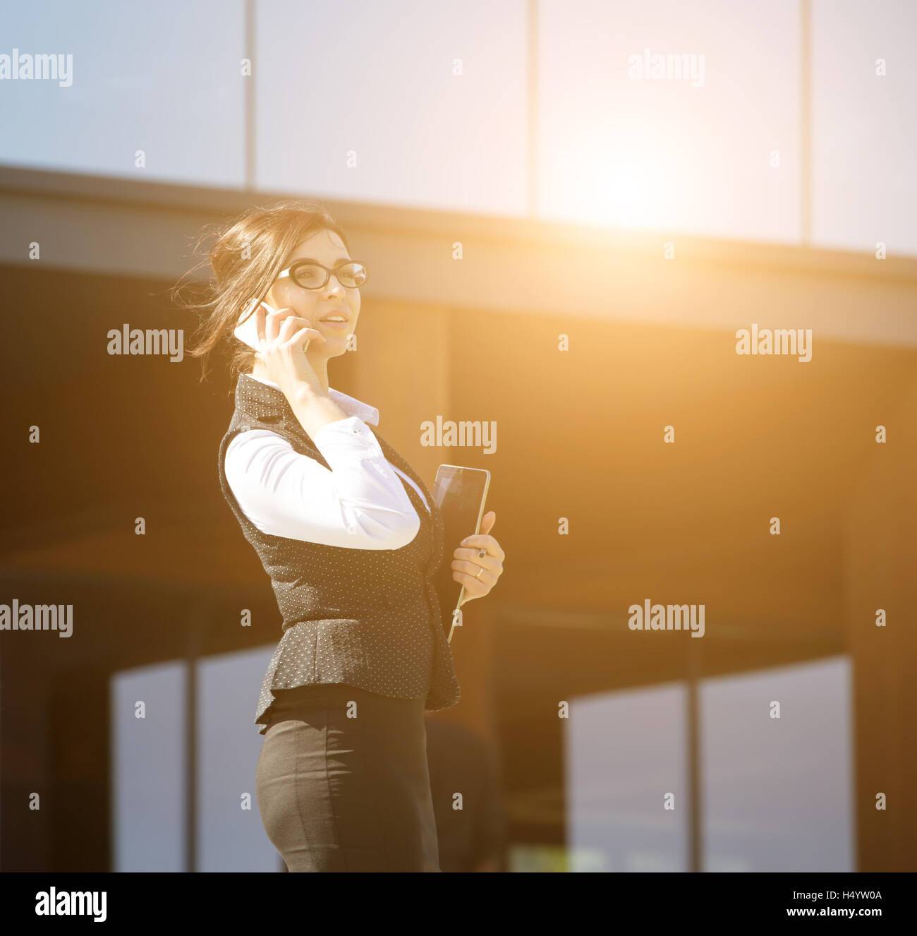 Portrait of a young smiling business woman Stock Photo - Alamy