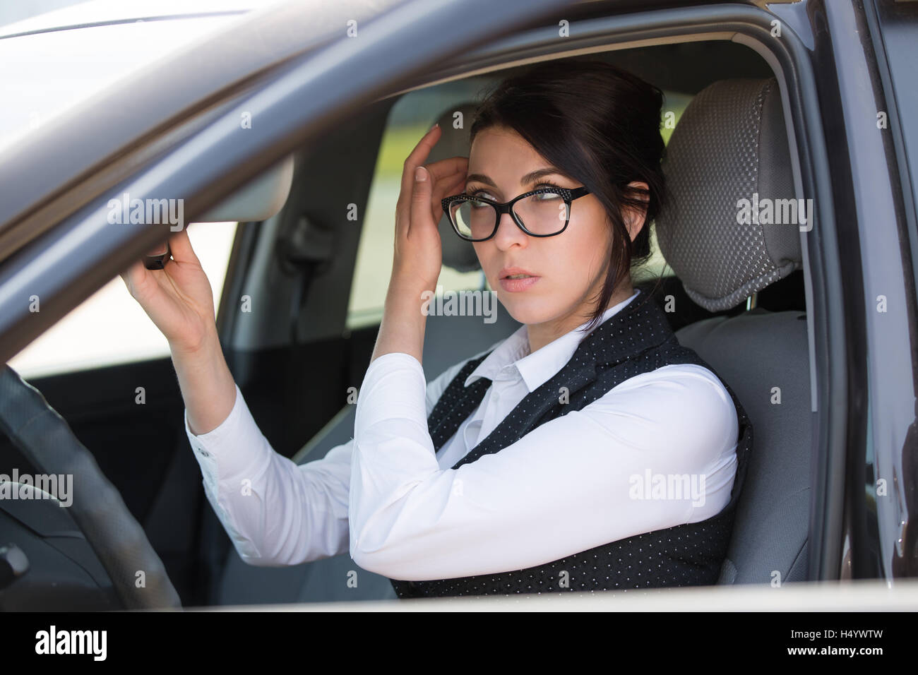 happy young woman in the car Stock Photo