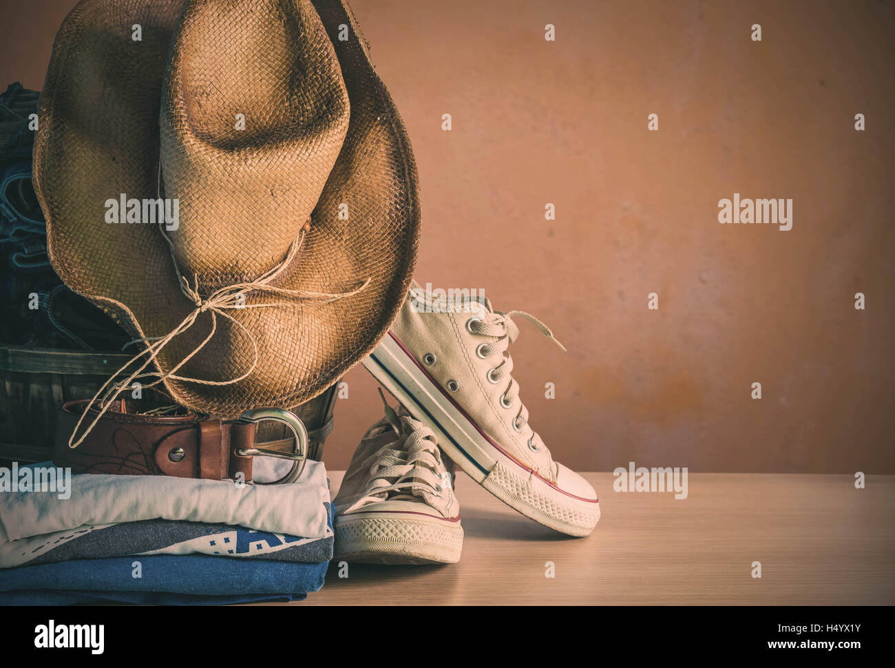 Clothing and apparel on the wooden floor. Stock Photo
